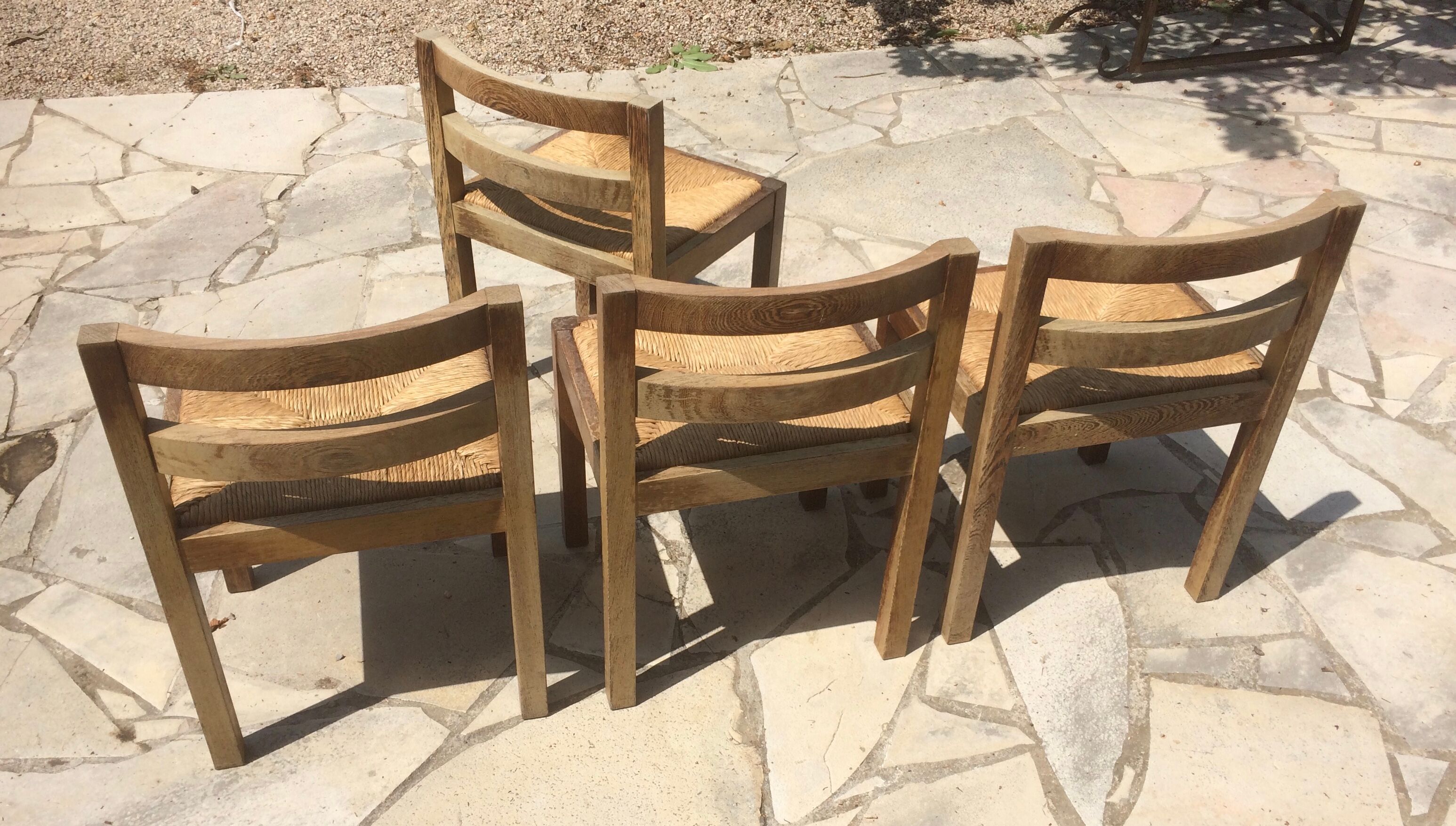 Four straw chairs