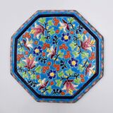 A flat bottom and two enamel bottle bottoms of Longwy