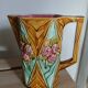 Antique pitcher in Onnaing slipware