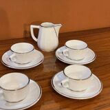 Four porcelain "bistro" cups and saucers