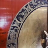 Antique red cabinet with brass details