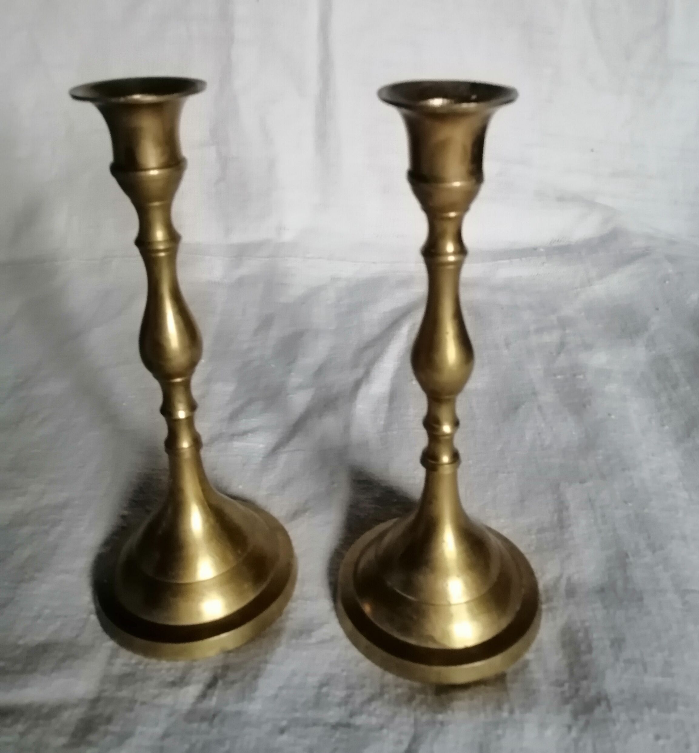 Set of 4 brass candle holders