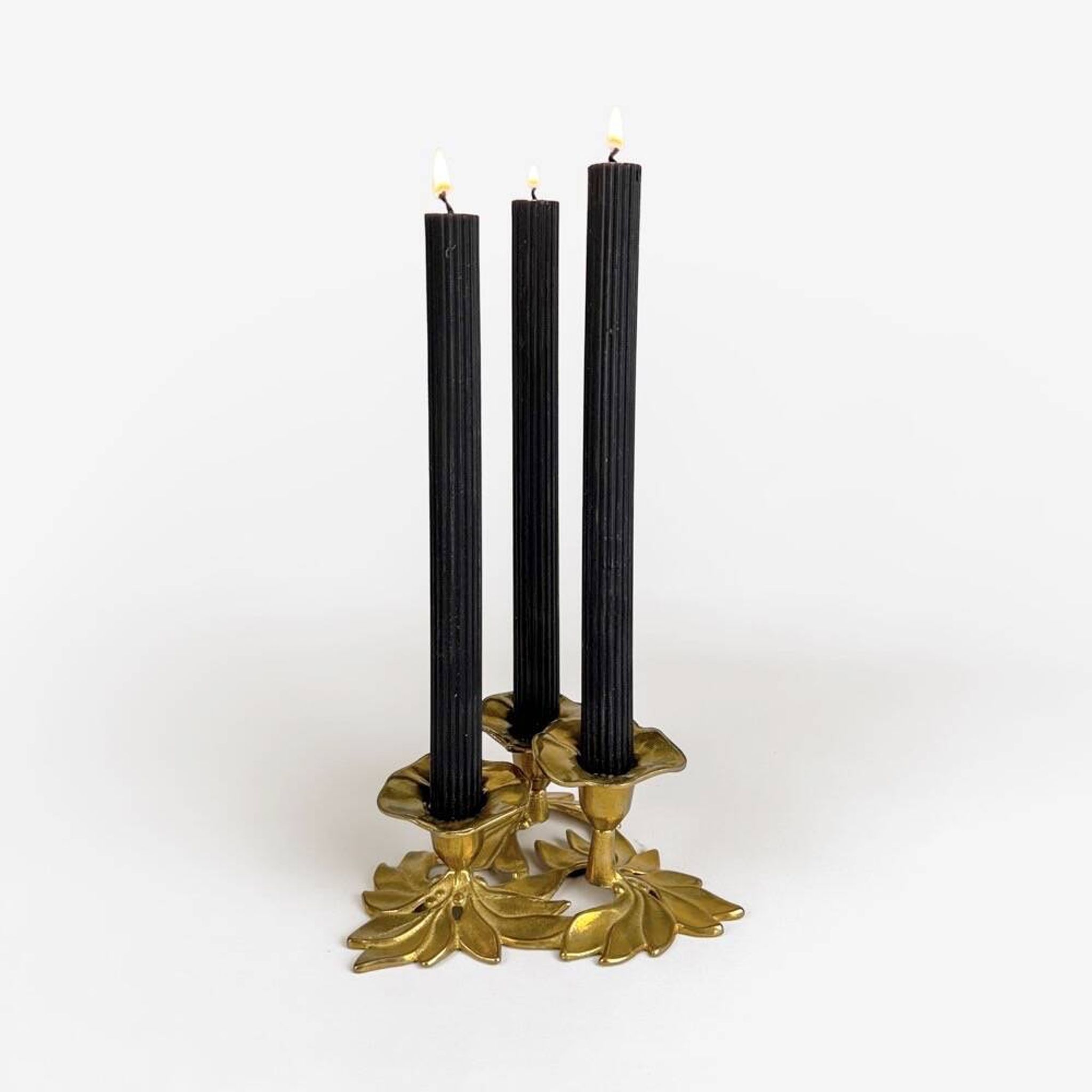 Art Nouveau style three-flower brass candle holder