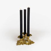 Art Nouveau style three-flower brass candle holder