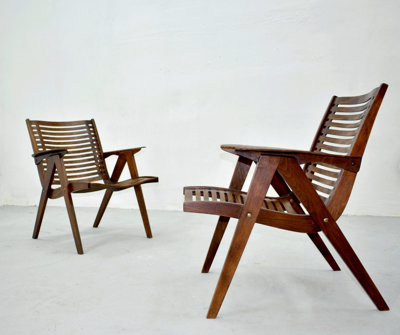 Chairs designed by Niko Kralj produced by Stol Slovenia
