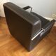 Fauteuil en cuir marron industriel