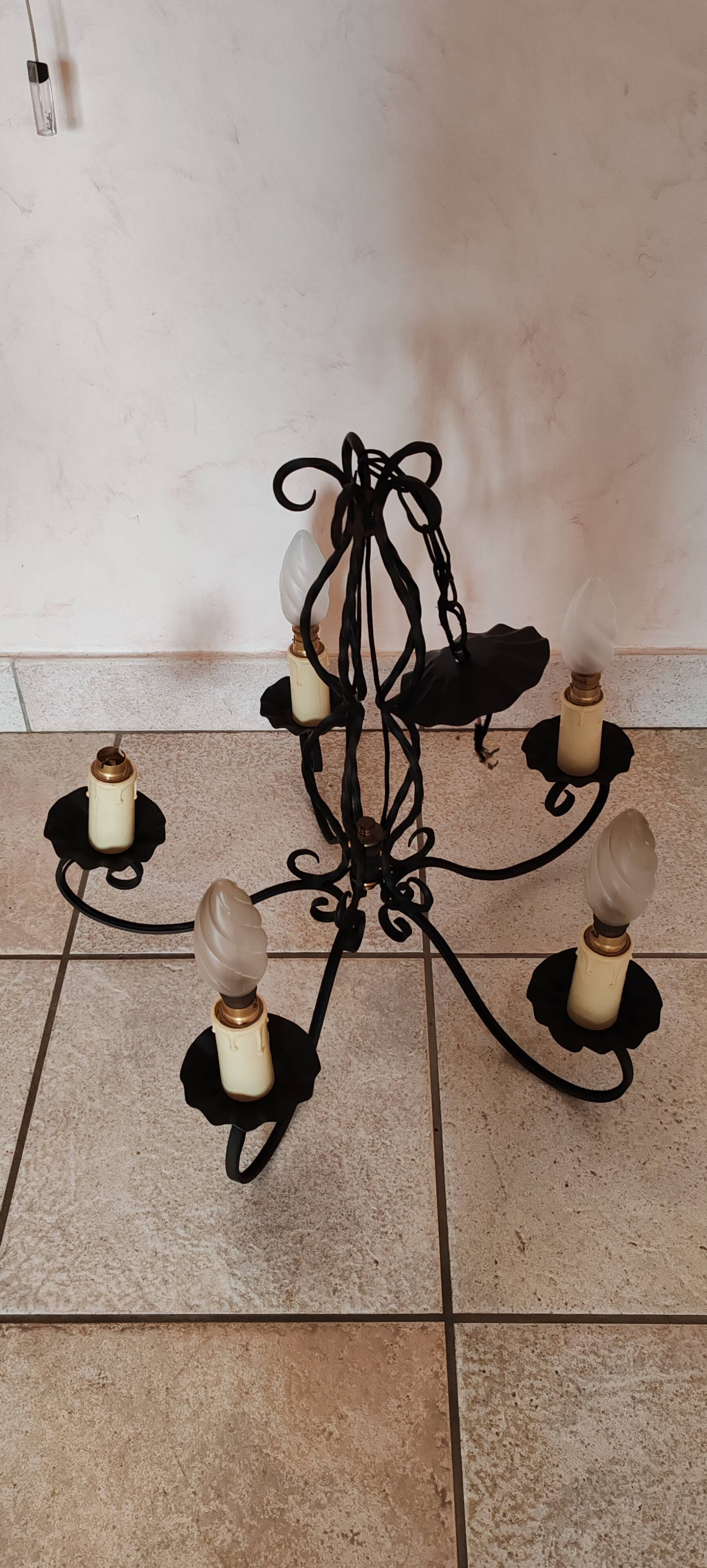 Antique wrought iron chandelier with 5 branches.