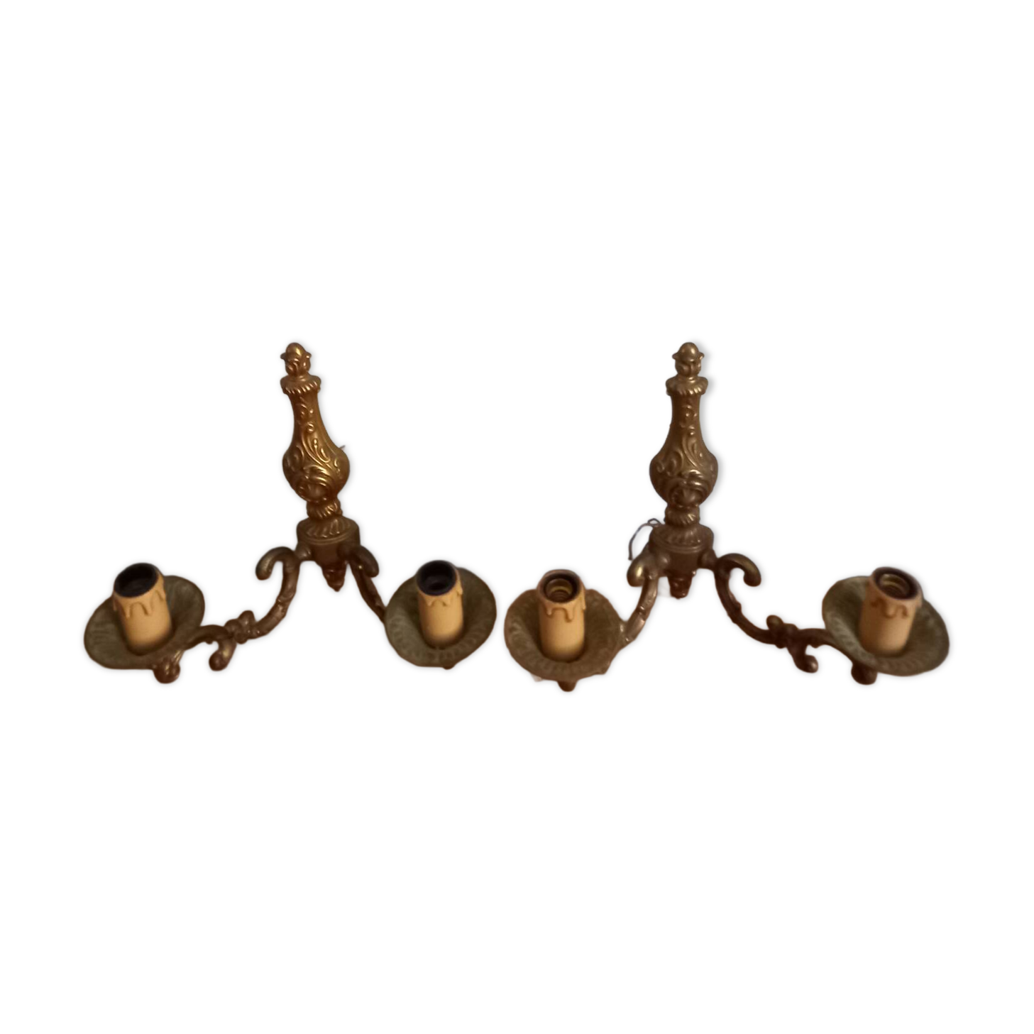 Old pairs of bronze wall sconces