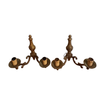 Old pairs of bronze wall sconces