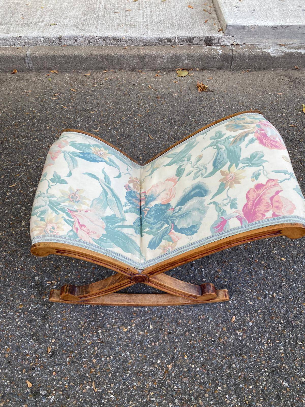 Kneeling prayer desk with rocking footrest in solid wood, curule style & floral fabric.