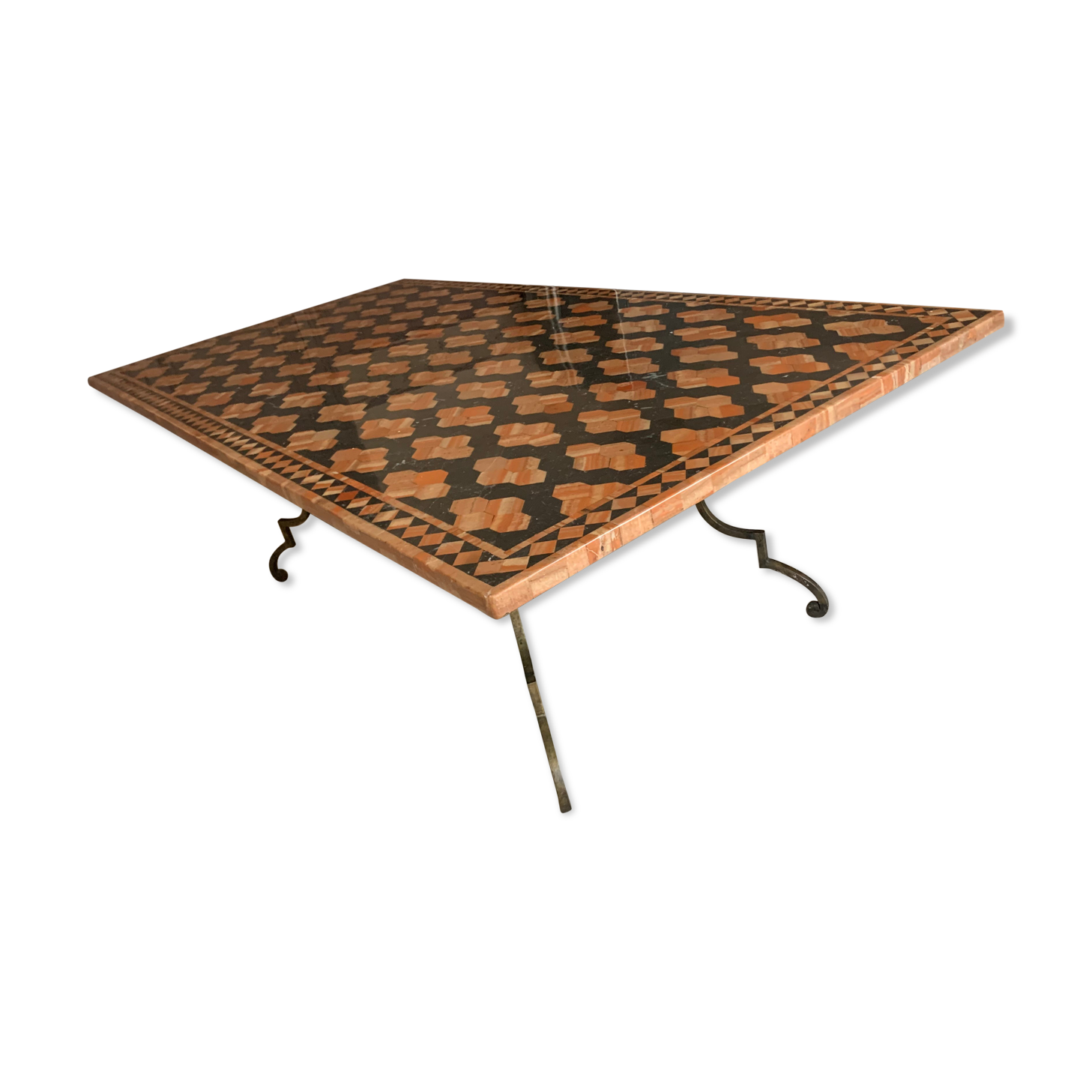 Wrought iron table on marble