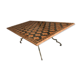 Wrought iron table on marble