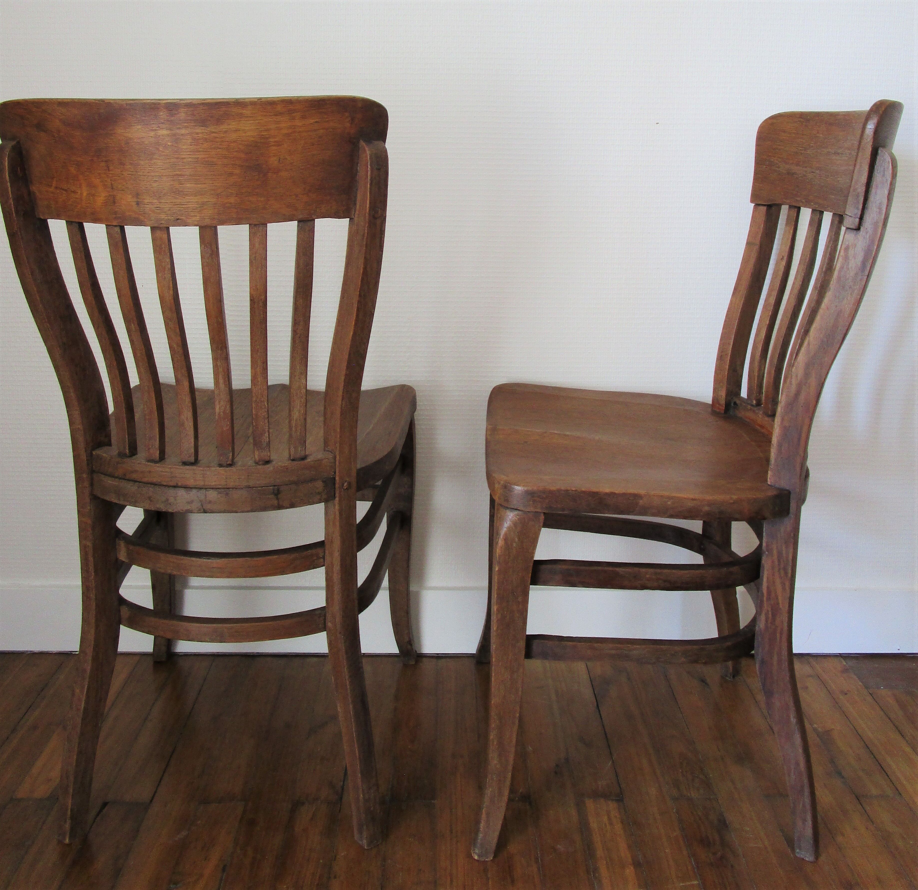 Two chairs solid oak patinated early twentieth century