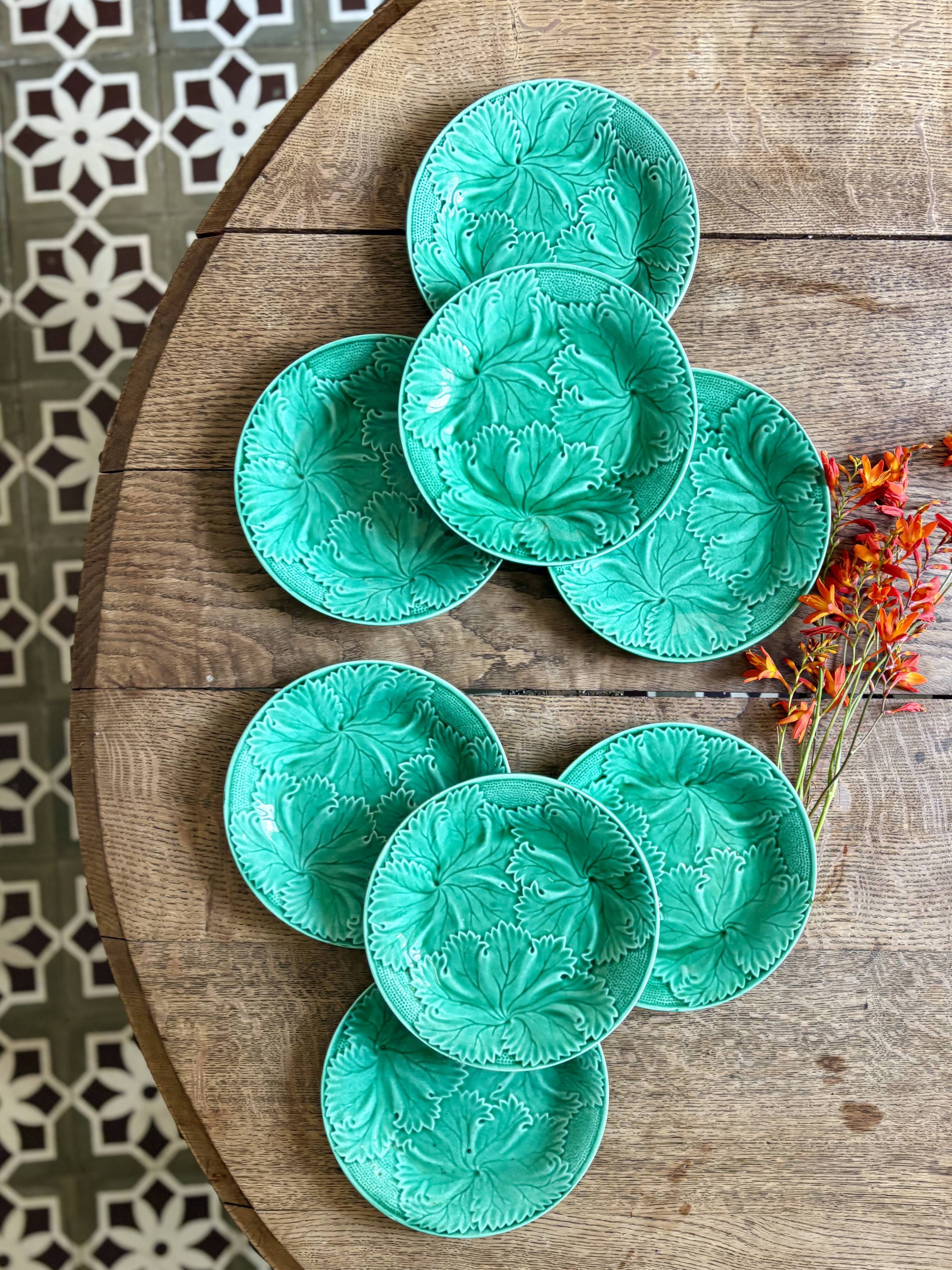 Set of 8 vintage green faience dessert plates, majolica.