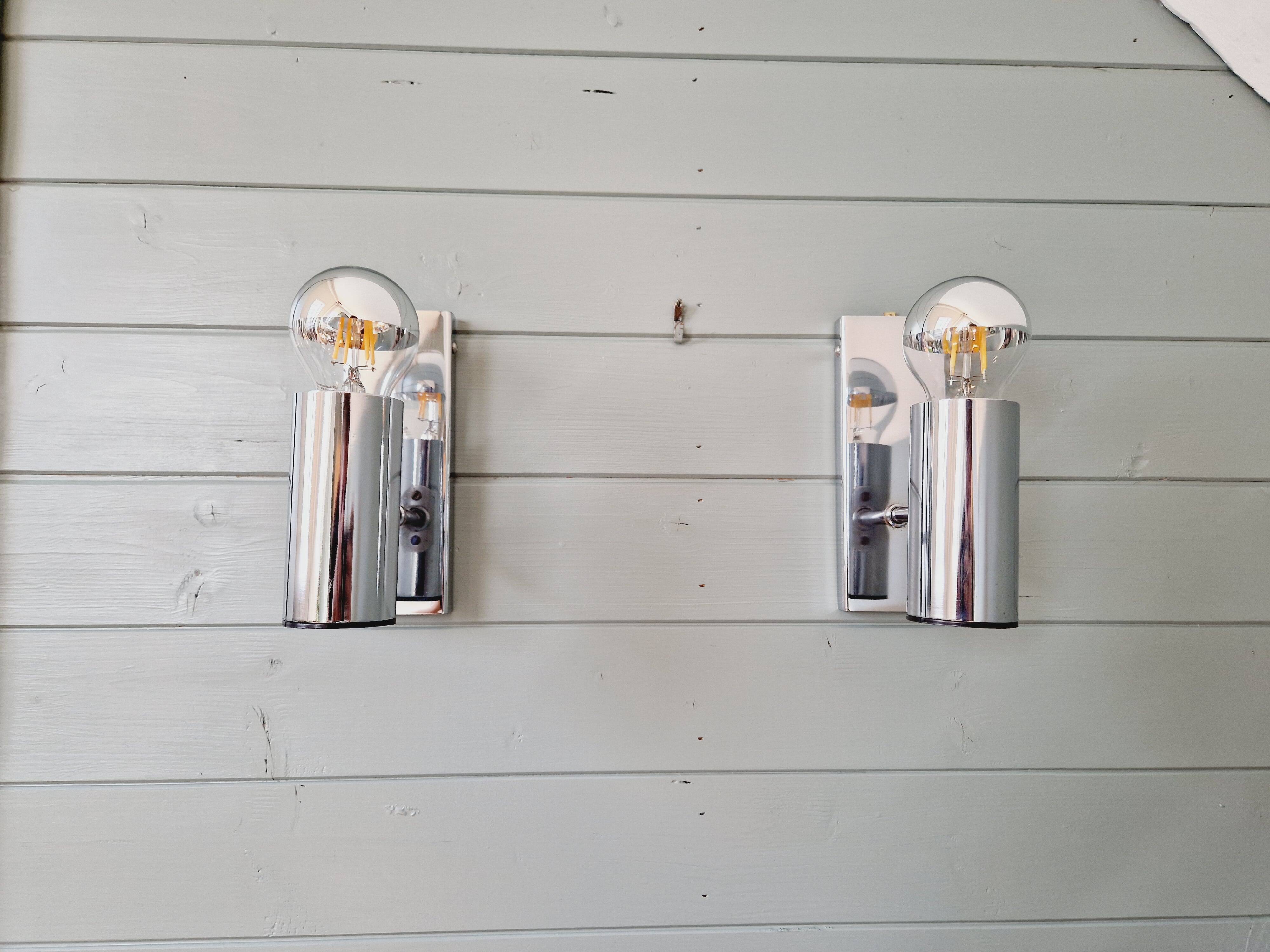 Pair of tubular chrome-plated metal wall sconces, 1970s