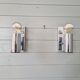 Pair of tubular chrome-plated metal wall sconces, 1970s