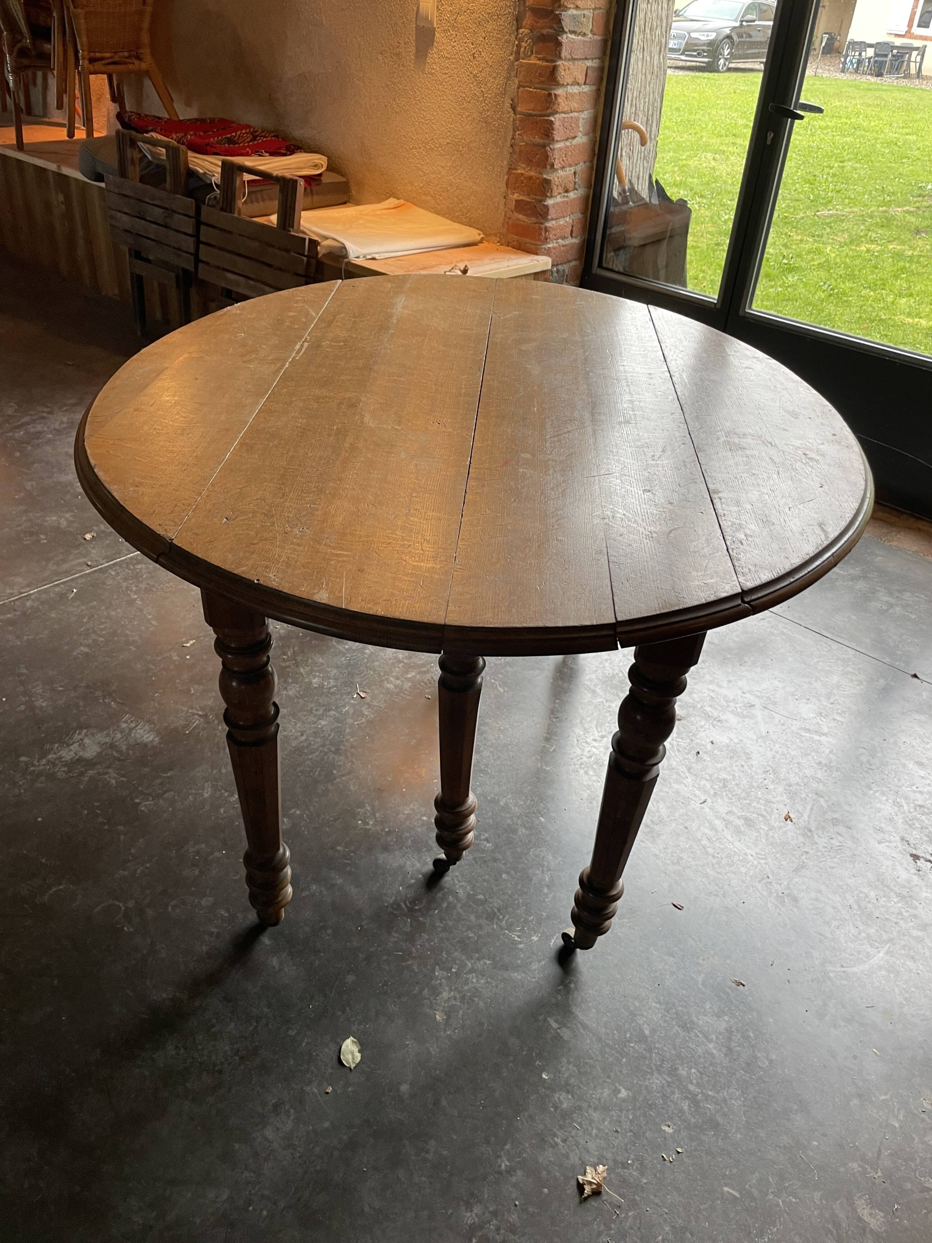 Old wooden table with folding flaps