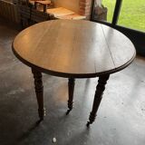 Old wooden table with folding flaps