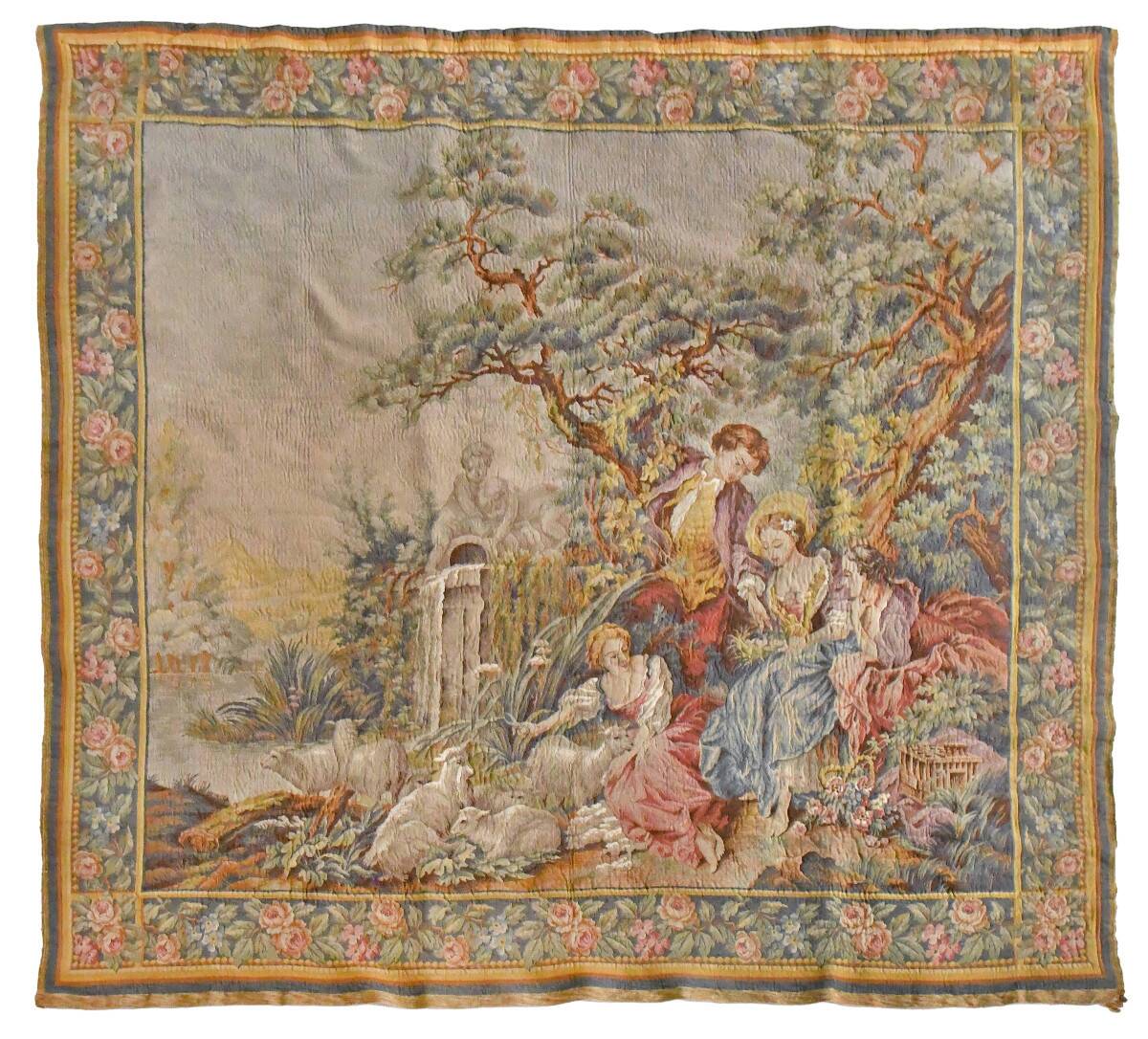 Wall tapestry featuring a pastoral scene.
