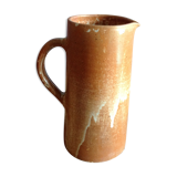 Pitcher in water in sandstone