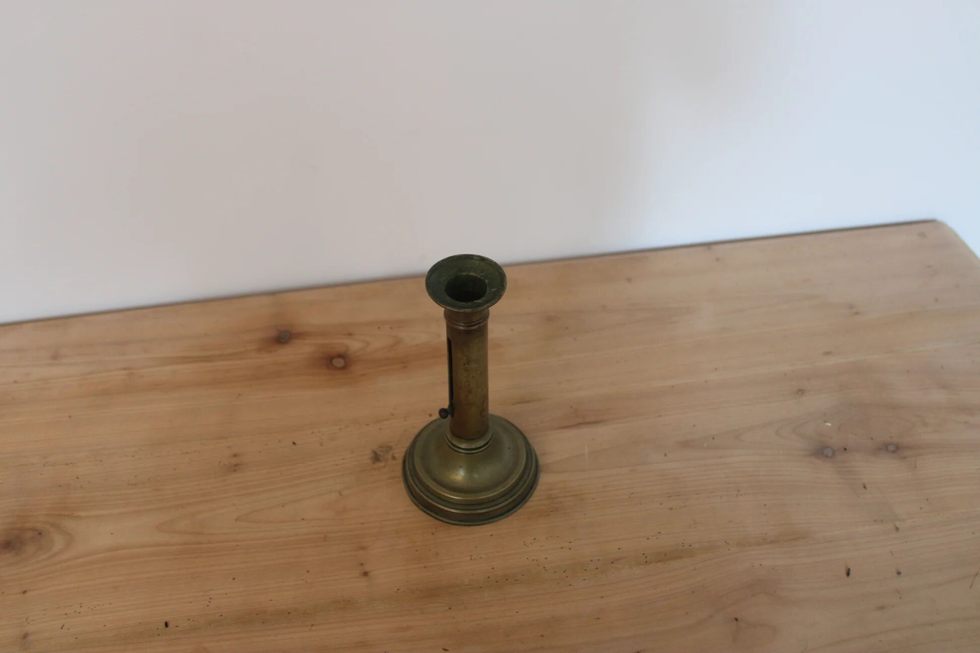 Antique brass push candle holder – vintage patinated candlestick H20 cm