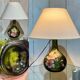 Blown glass lamp painted with a floral design, early 20th century.