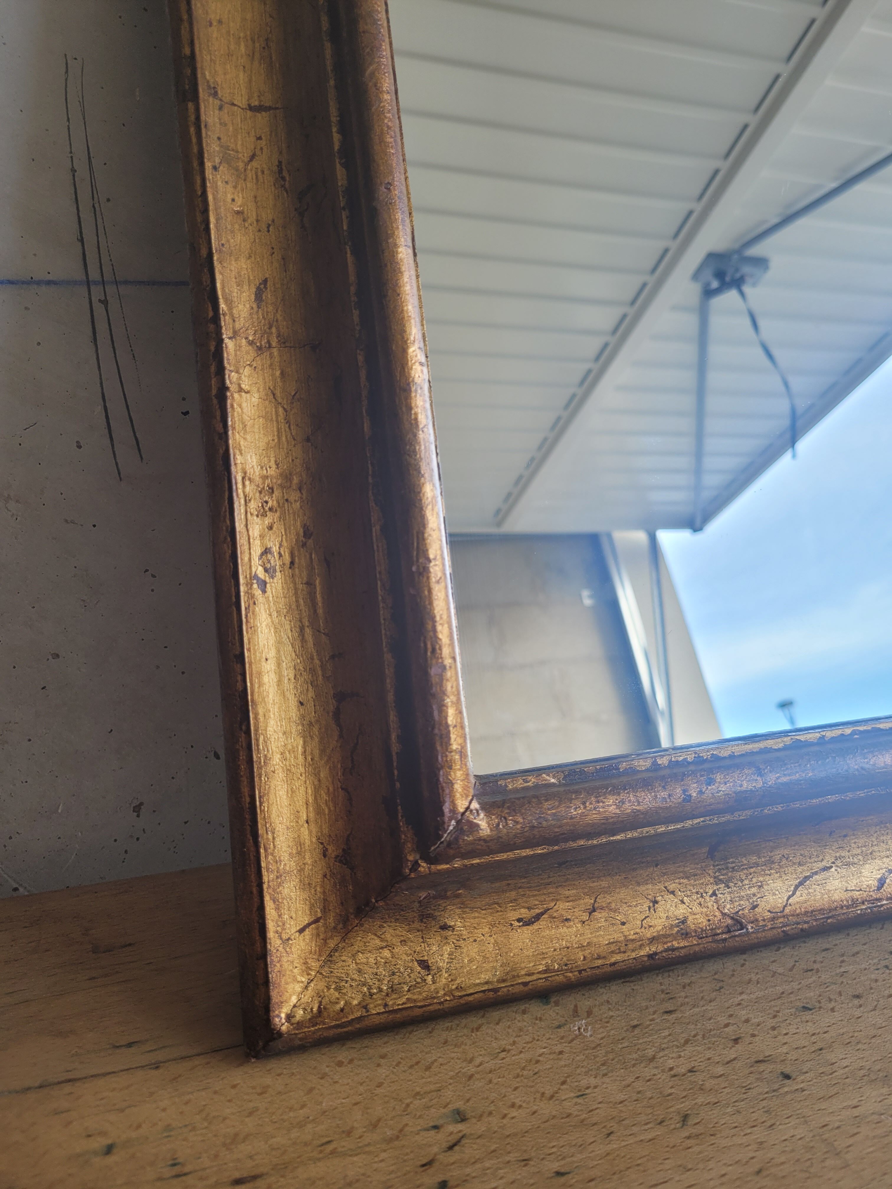 Miroir ancien en bois doré 42x52cm