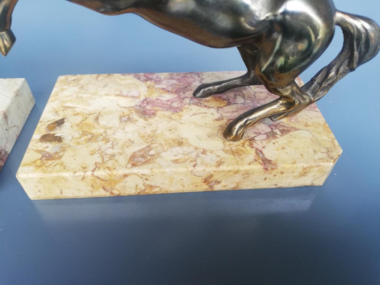 Pair of art deco bookends in bronze and marble
