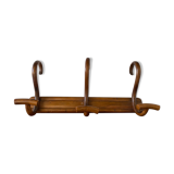 Wooden coat rack turned upside down