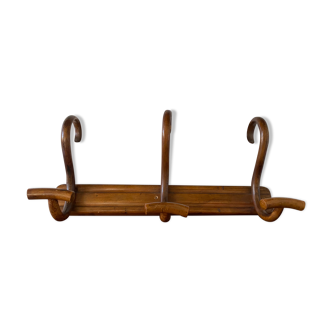 Wooden coat rack turned upside down