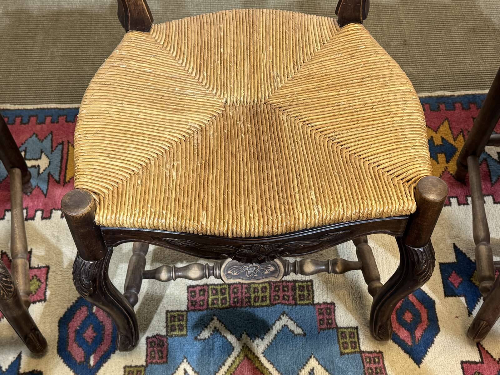 Set of 7 Louis XV style beech chairs with straw seats.