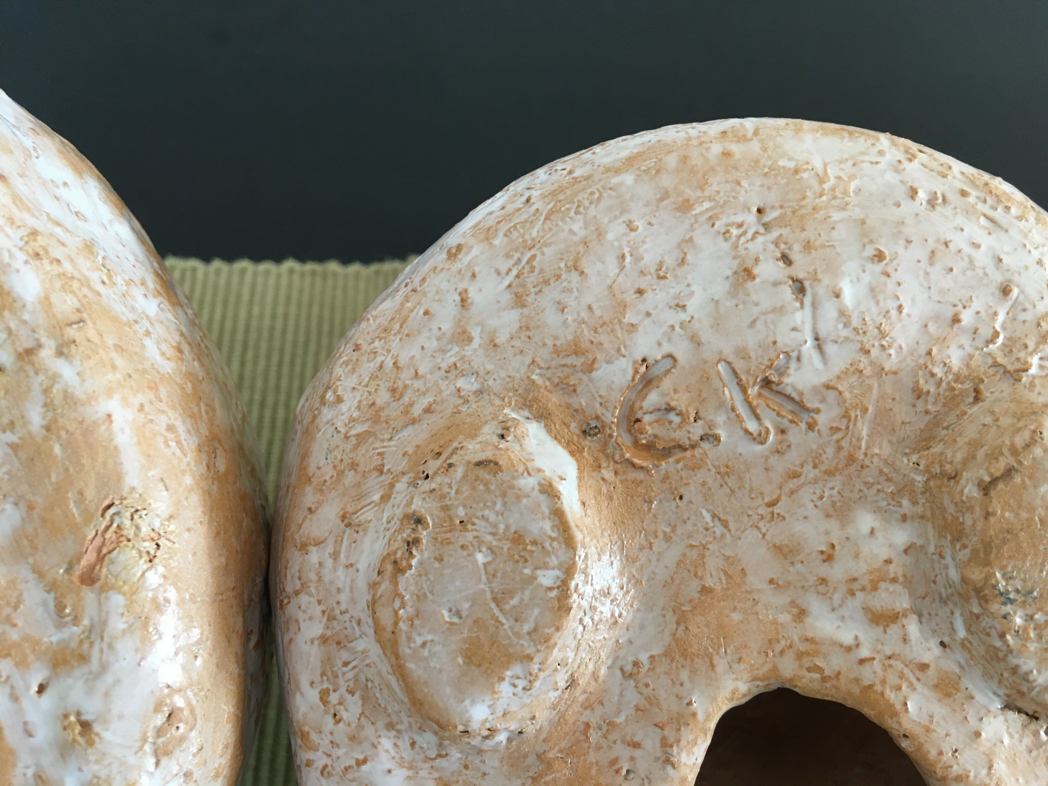 Pairs of birds in ceramic signed