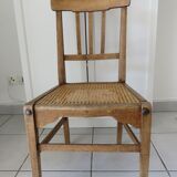 Antique solid wood chair with caning, country house style.