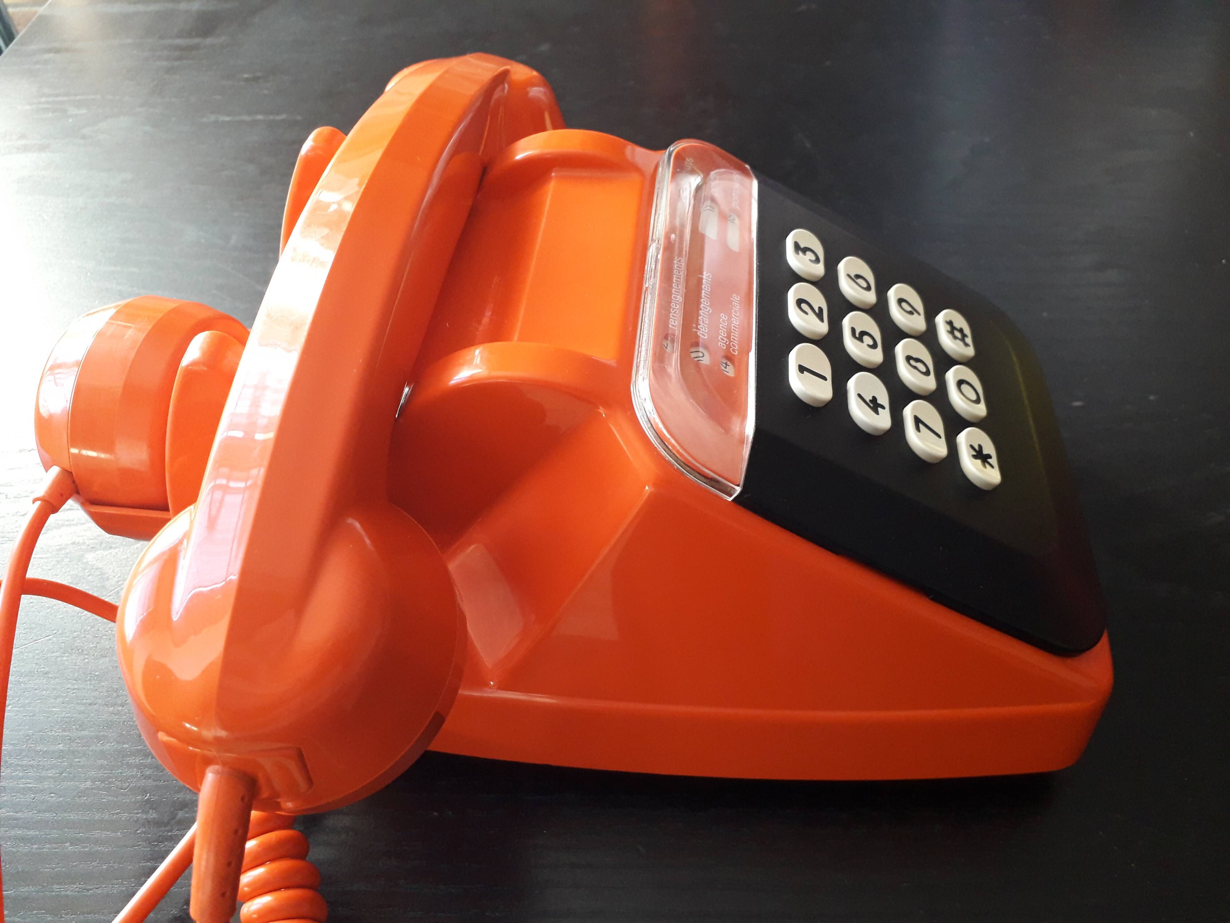 Old vintage orange phone s63 socotel