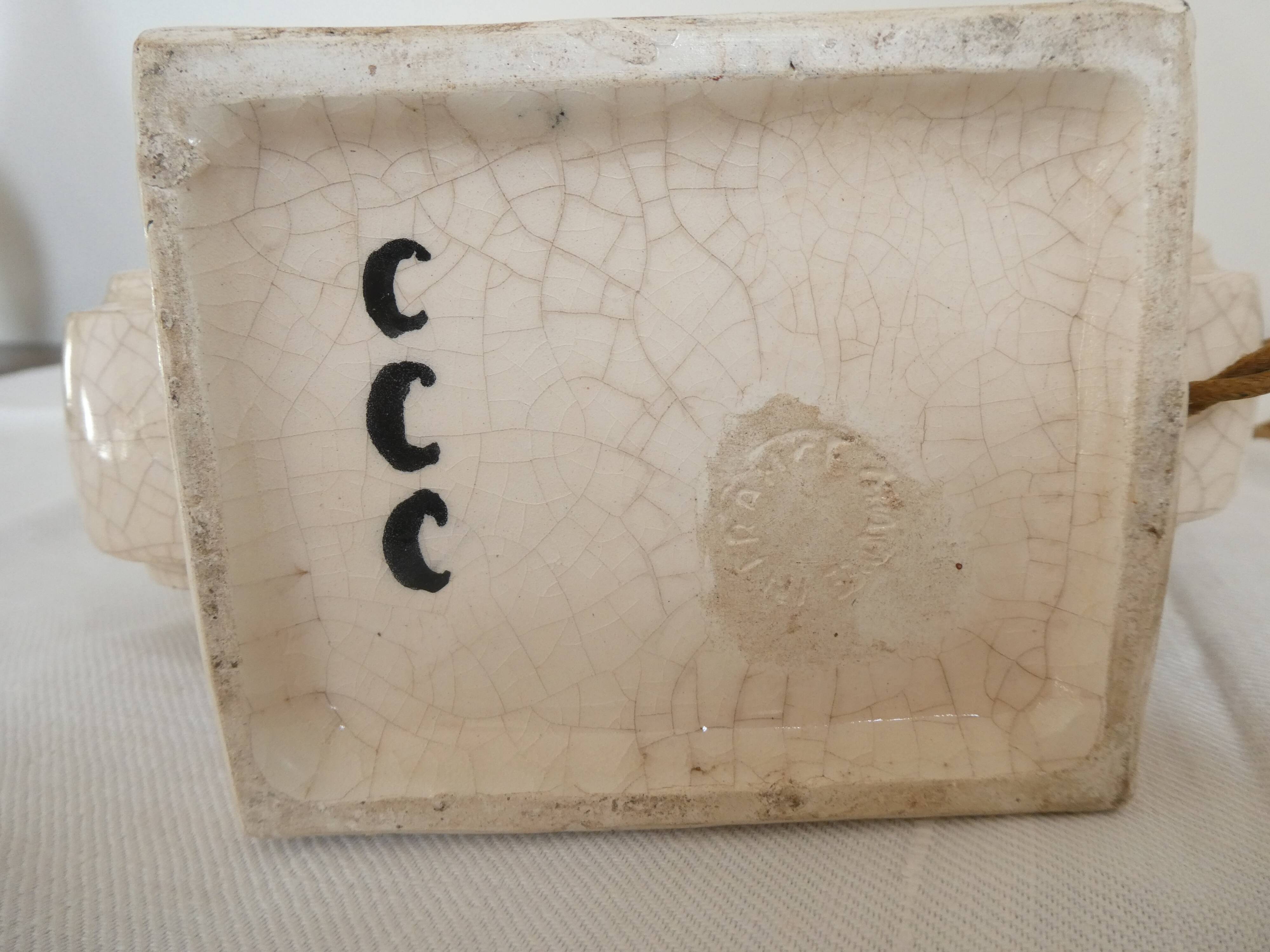 Cream cracked ceramic lamp base in Scandinavian style.