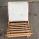 Folding rocking footrest in wood and white leather