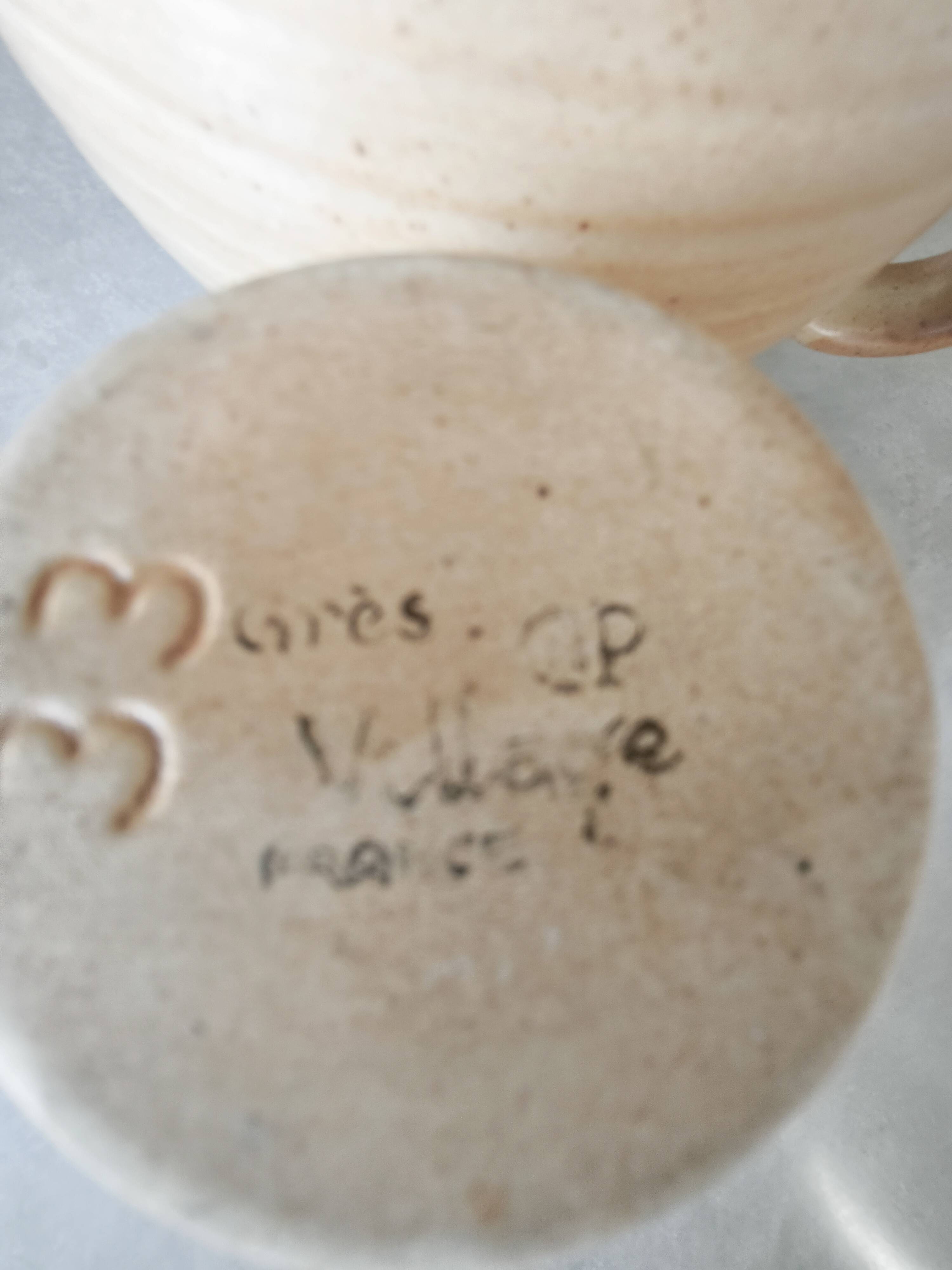 Set of two Village de France stoneware pitchers