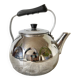 Vintage kettle in chrome metal and bakelite