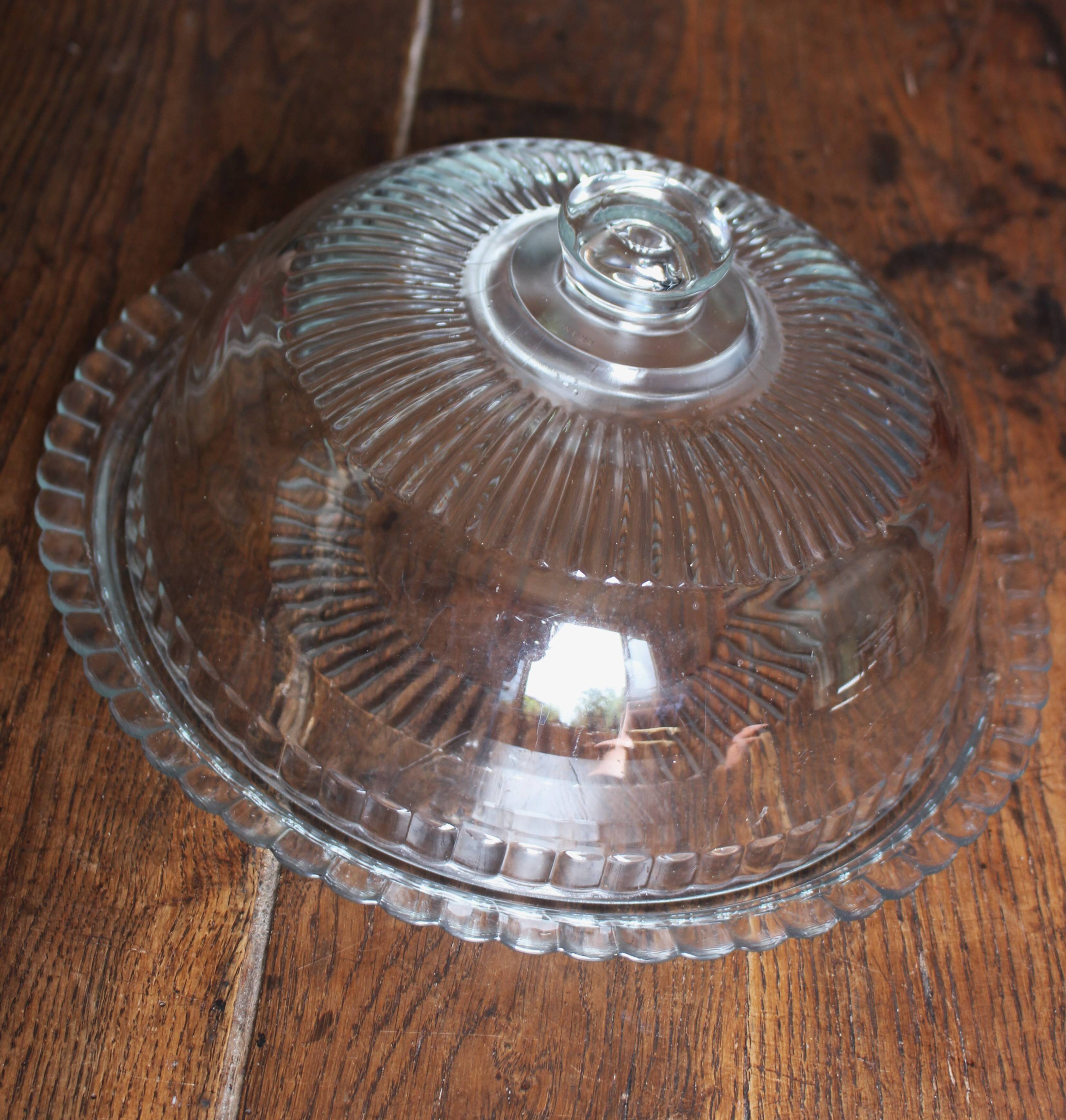 Large glass bell jar and its vintage cheese dessert plate.