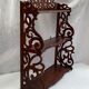 Old wall shelf in worked wood dimension: height -67cm- width --55cm-
