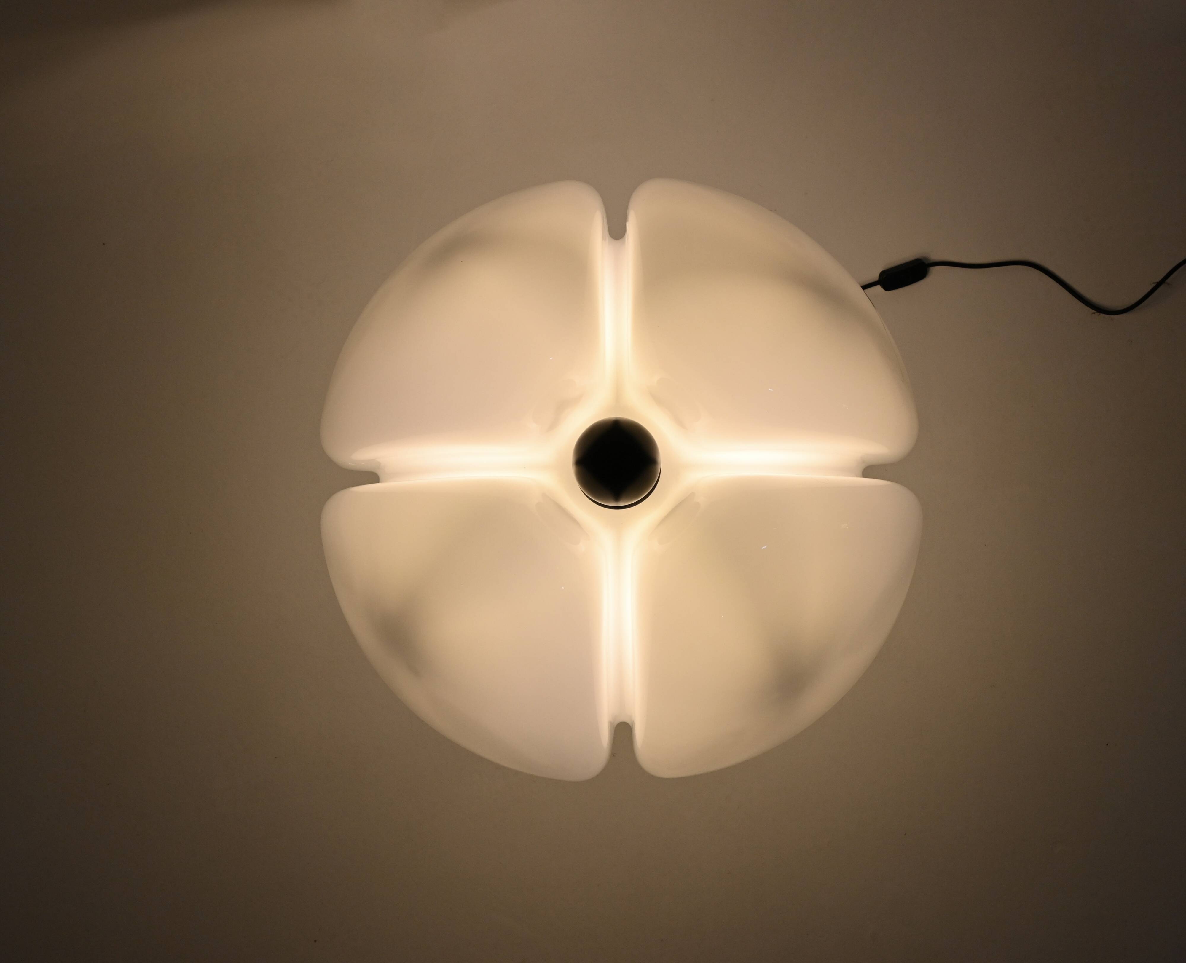 Black "Pipistrello" table lamp by Gae Aulenti for Martinelli.