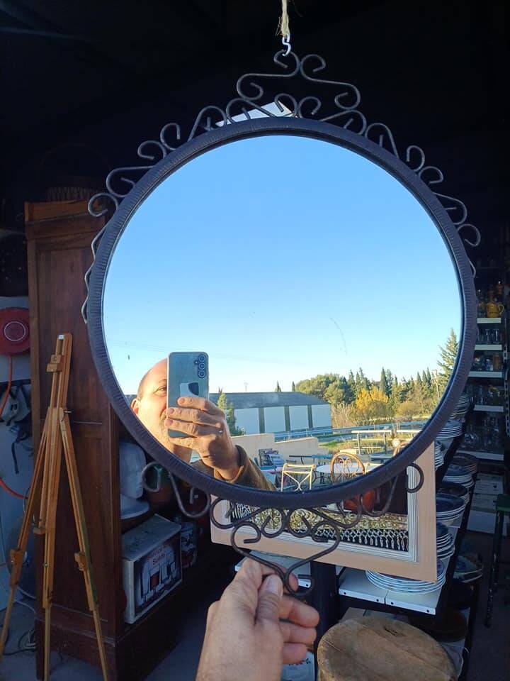 Vintage wrought iron round mirror