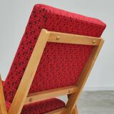 Pair of armchairs in mottled red and wood by Uluv, former Czechoslovakia 1960