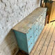 Old workshop cabinet with flaps, original patina.