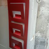 Vintage red metal wall magazine rack