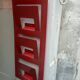 Vintage red metal wall magazine rack