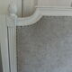 160-style louis XVI style headboard patinated pearl grey waxed finish, lined with grey velvet