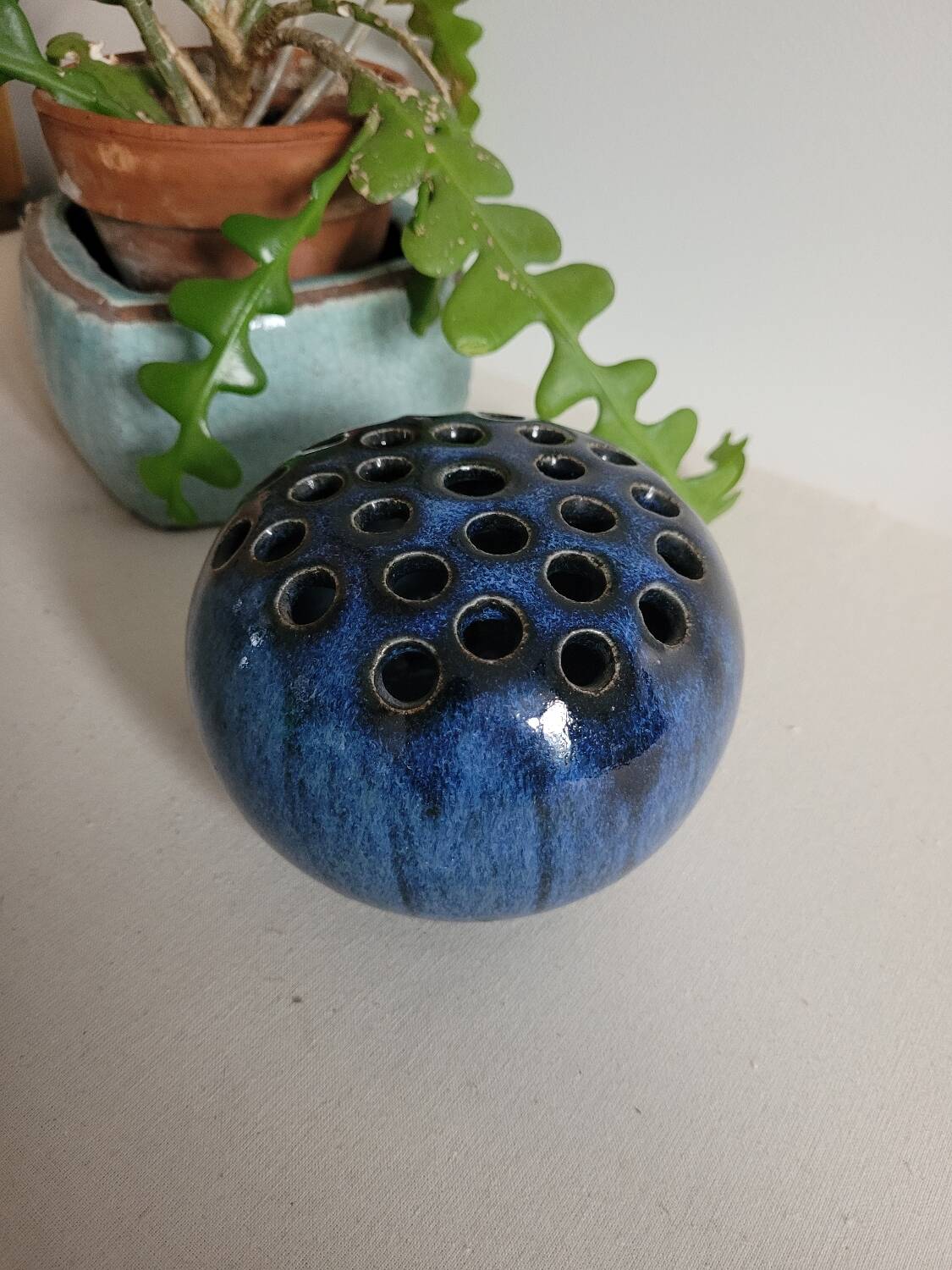 Glazed ceramic flower holder