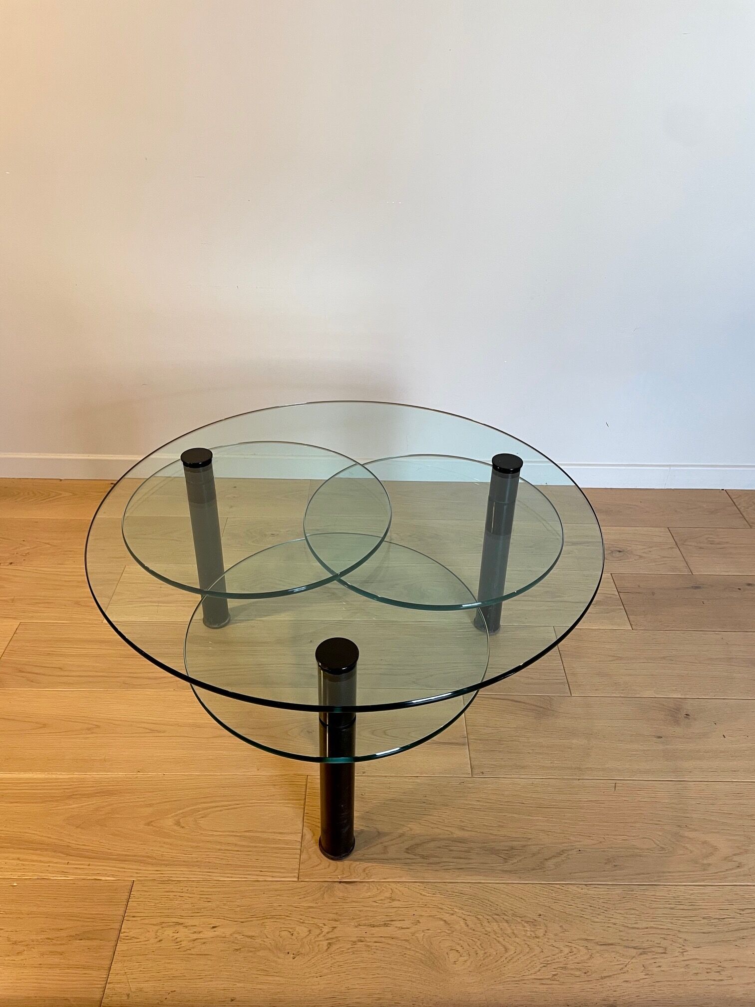 Glass coffee table and black base
