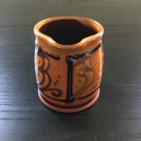 Hand decorated terracotta pitcher